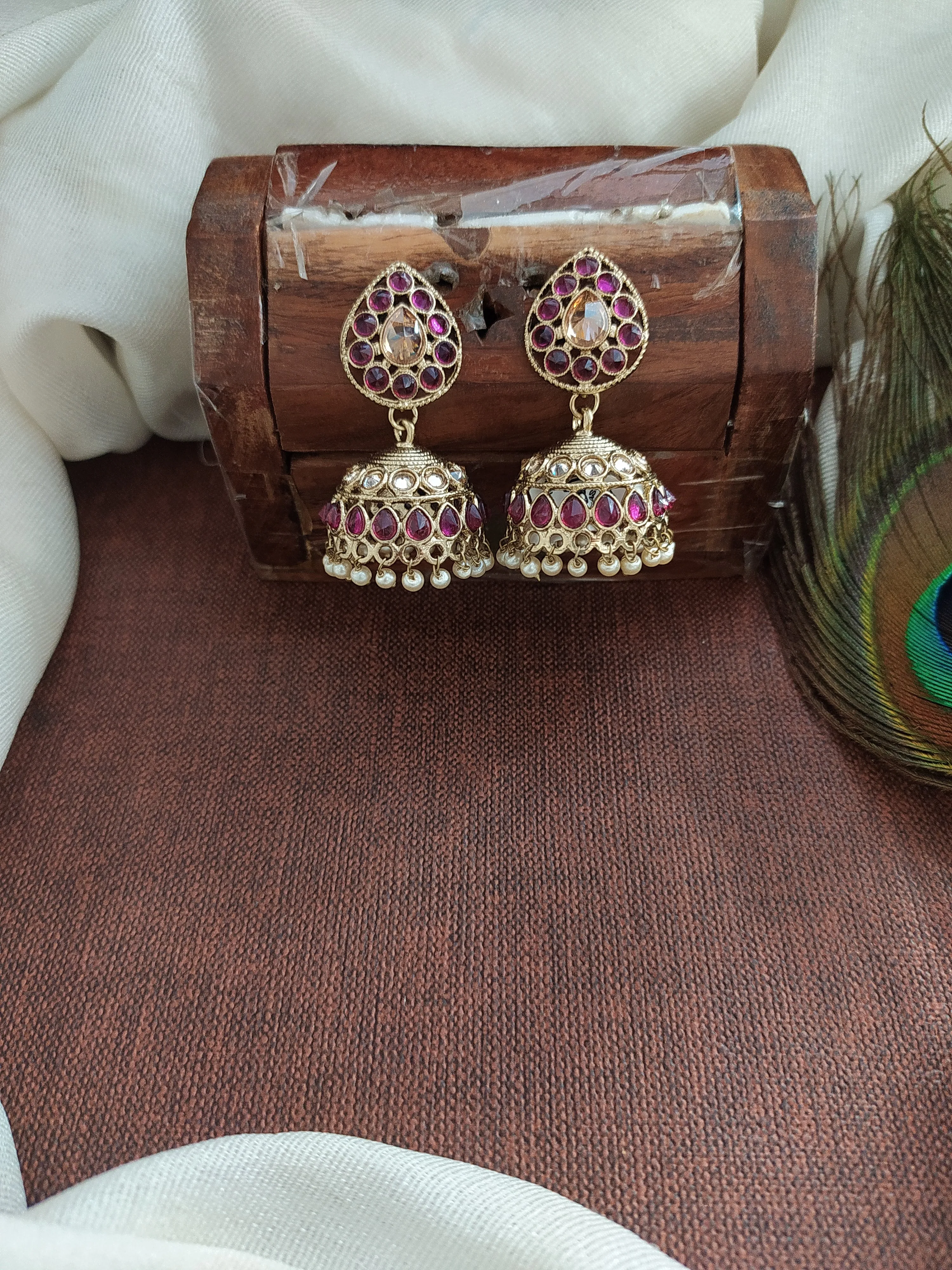 Embrace Timeless Beauty Of Uncut Polki Stones Mehandi Jhumki