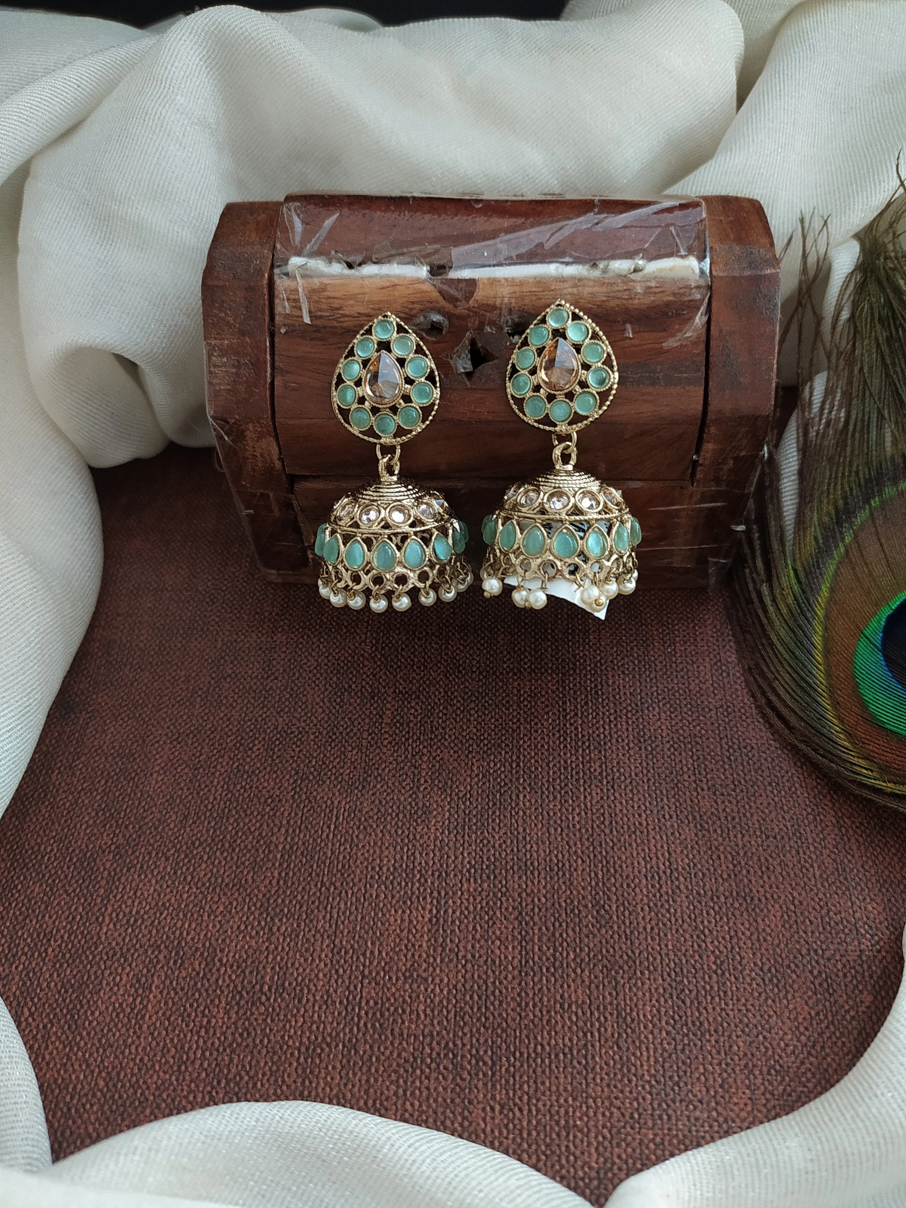 Embrace Timeless Beauty Of Uncut Polki Stones Mehandi Jhumki